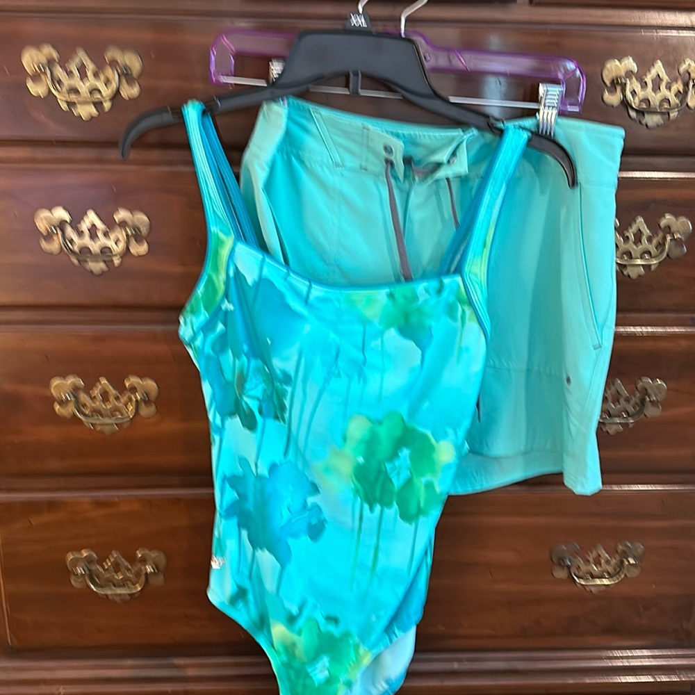 Speedo swimsuit with matching swim shorts.